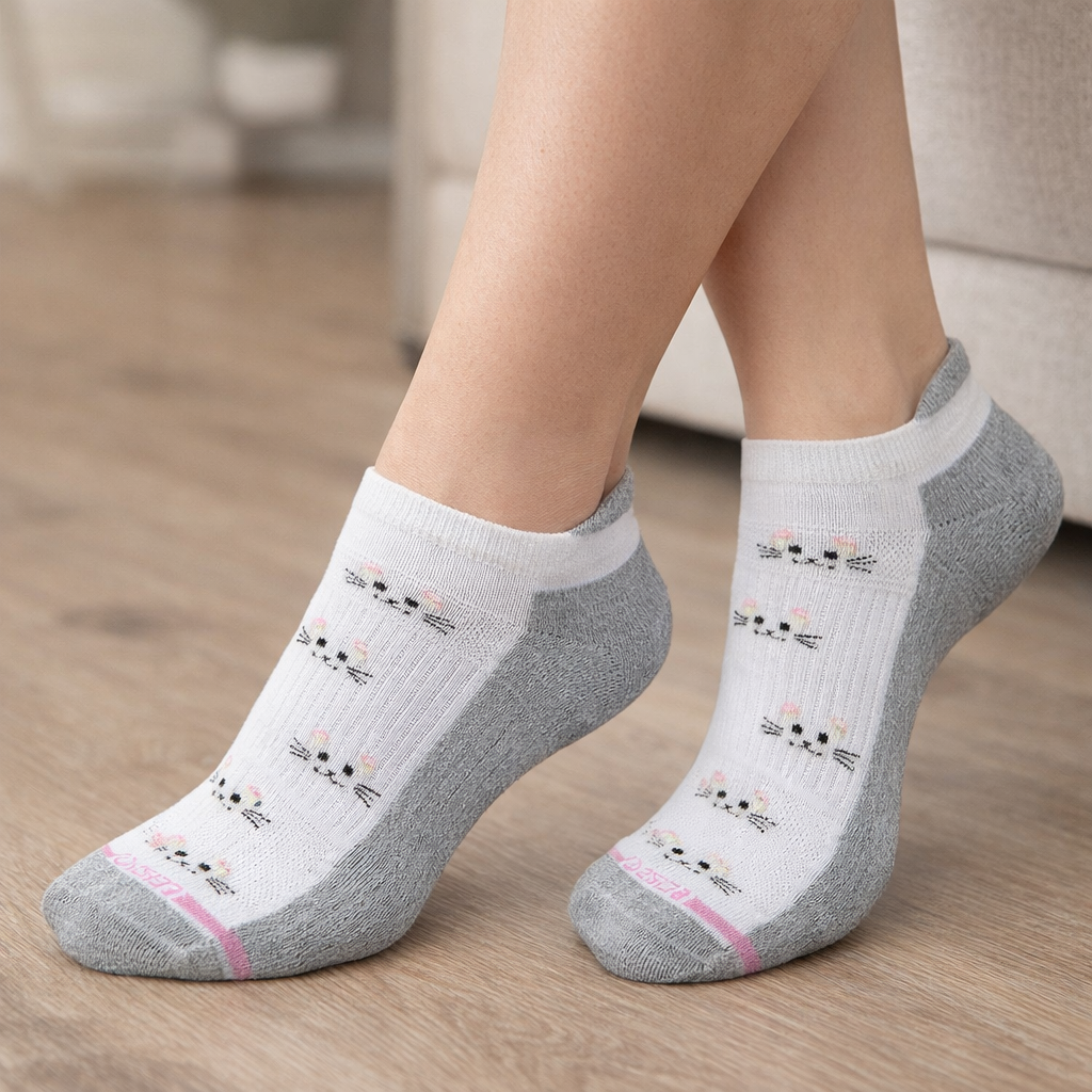 Dr. Motion ankle compression socks for women with cats design worn for everyday walking and comfort