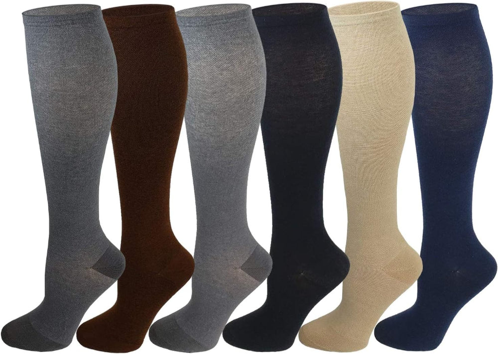 A set of six knee-high compression socks in various colors, displayed in two rows with three socks in each row. The colors include brown, gray, beige, and navy.