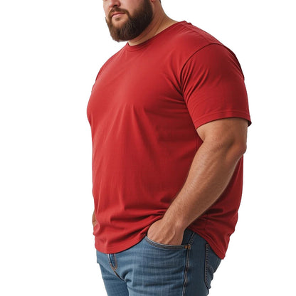 Man wearing a red t-shirt and blue jeans on a white background