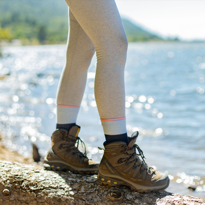 Women wearing Dr. Motion compression crew socks during outdoor walking and exercise
