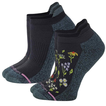 Woman wearing floral ankle compression socks while walking for everyday comfort and support