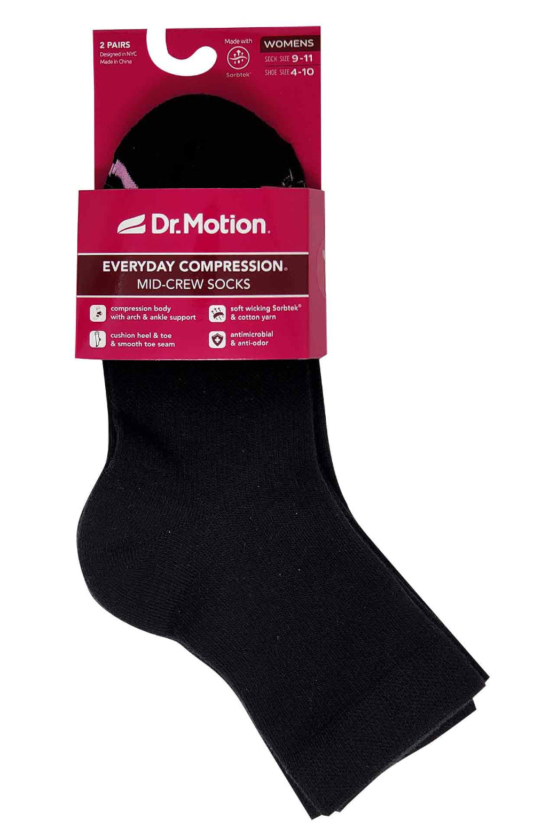 Black socks with Dr. Motion packaging on a white background
