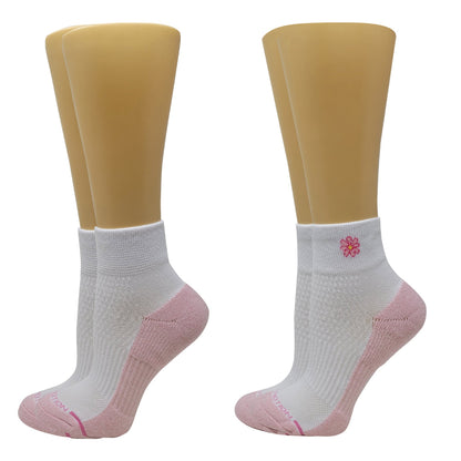 White Quarter Compression socks with pink accents on mannequin feet against a white background