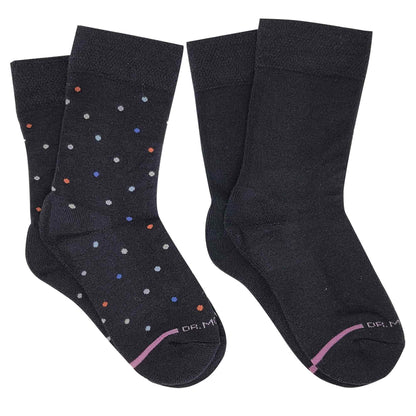 Two pairs of black compression crew socks, one with colorful polka dots, on a white background.