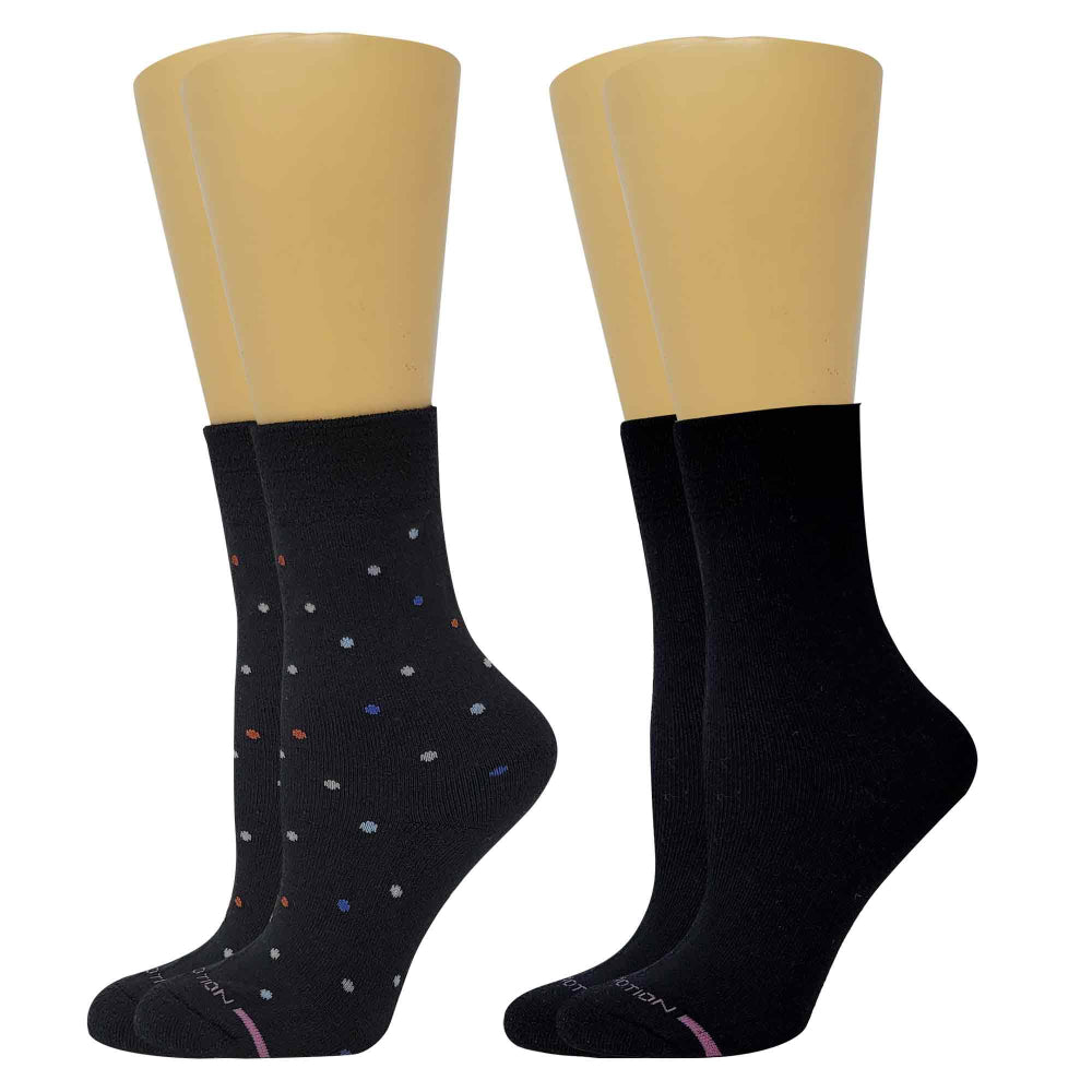 Two pairs of socks with beige tops and black bodies, one featuring polka dots, on a white background.