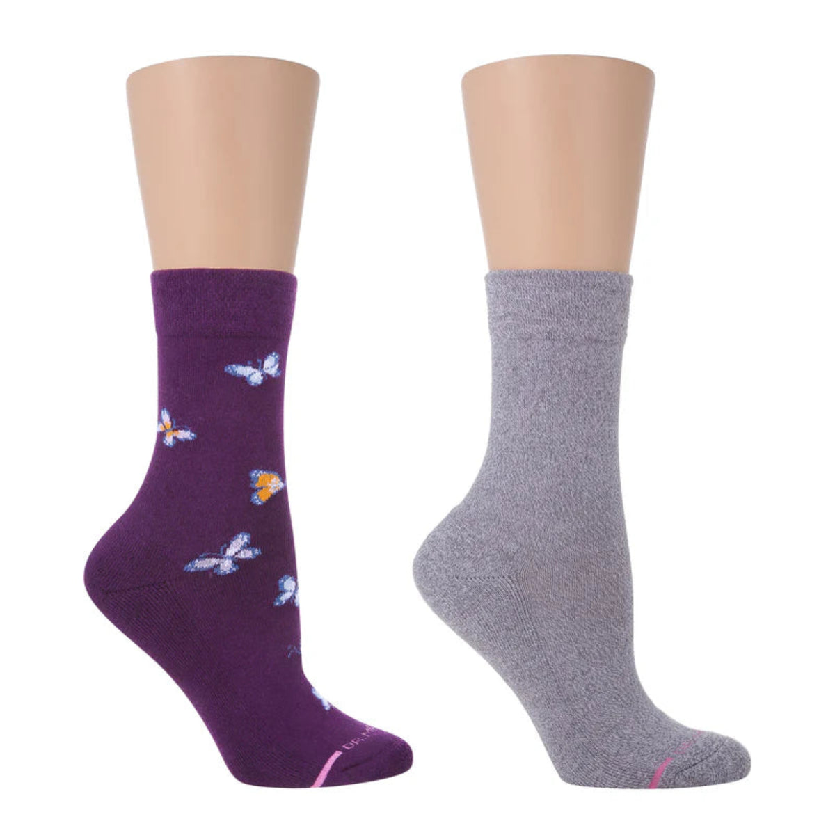 Two pairs of Dr. Motion crew socks, one purple with butterflies and one gray, both designed for diabetic patients with cushioned soles and a non-binding fit.