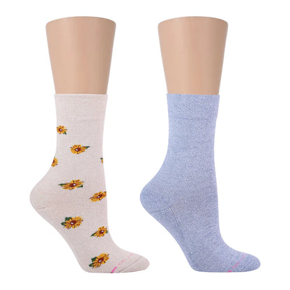 Two pairs of crew socks, one with a floral pattern and one solid blue, displayed on a mannequin leg.