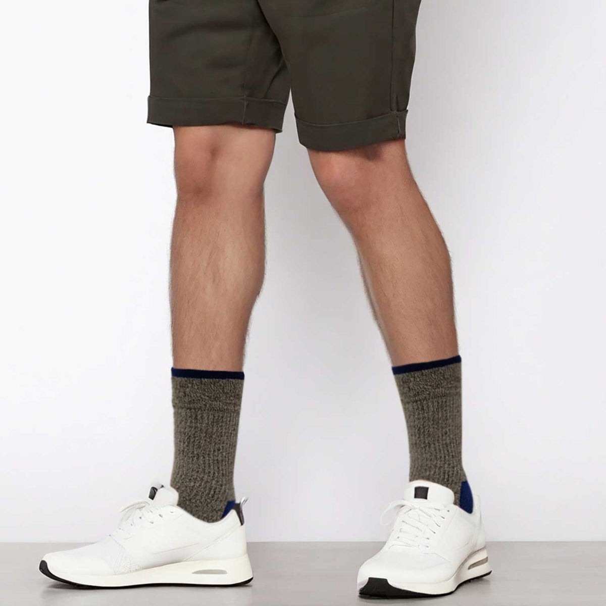 compression socks supporting men's feet during active movement