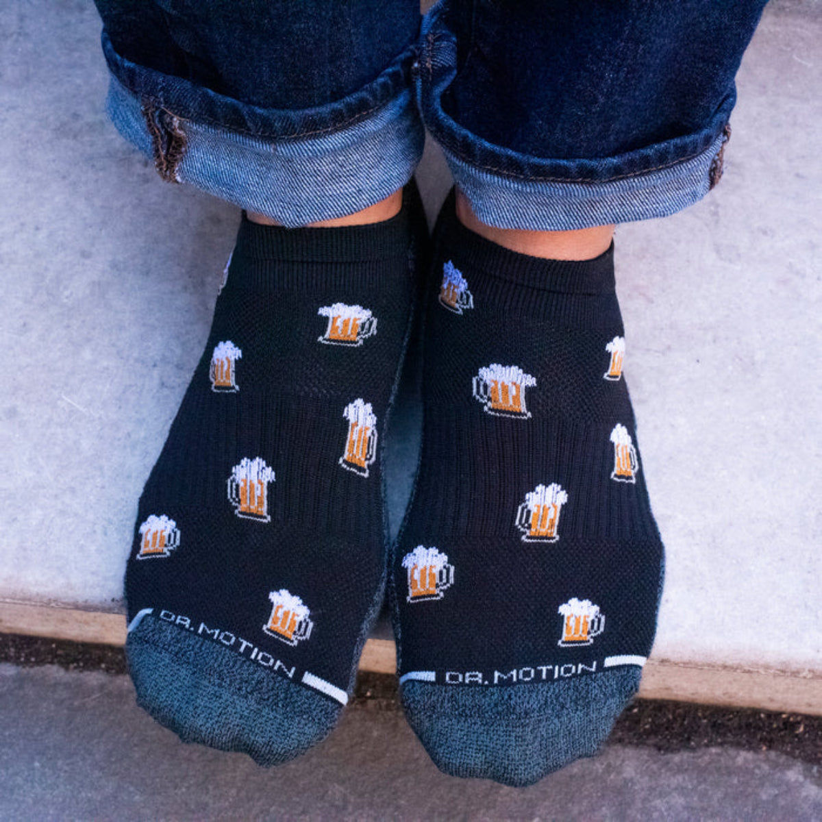 Close-up of men’s ankle compression socks showing reinforced toe, cushioned sole, and breathable mesh fabric
