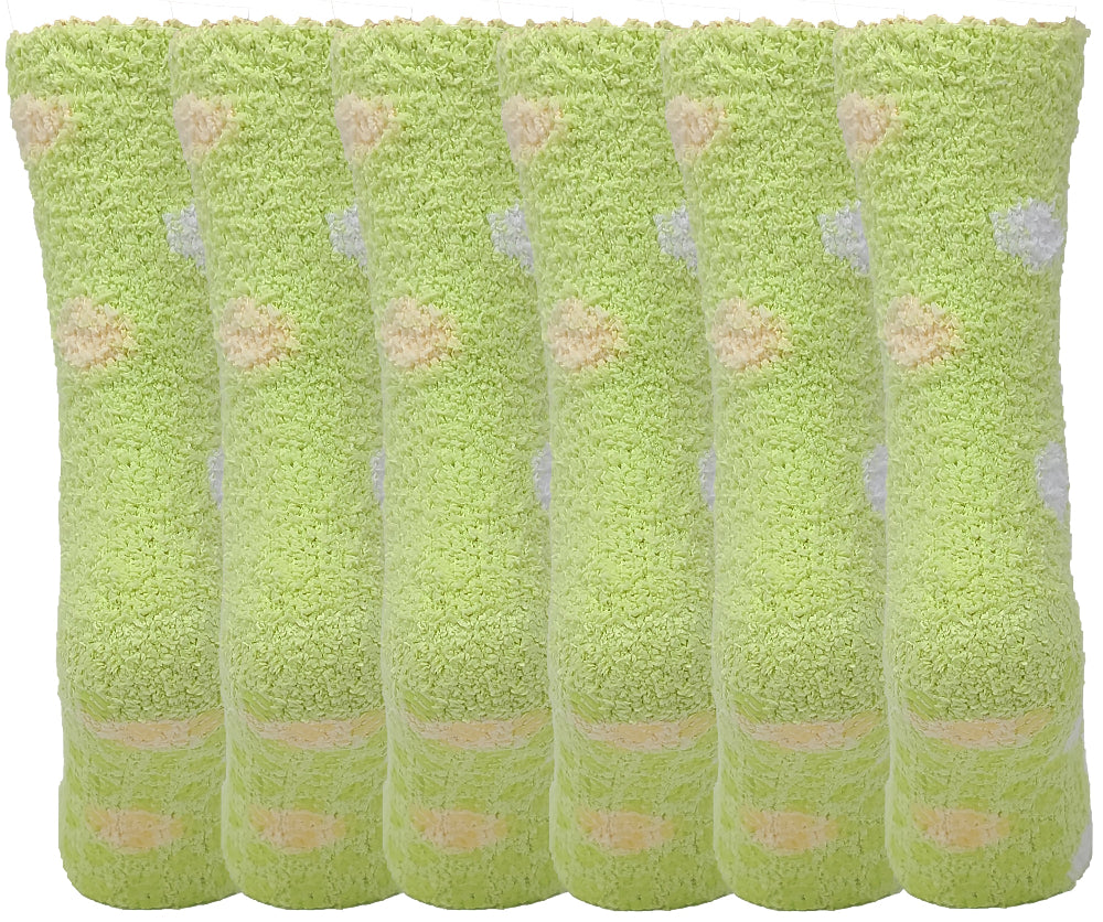 Set of six green slipper socks with heart patterns on a white background