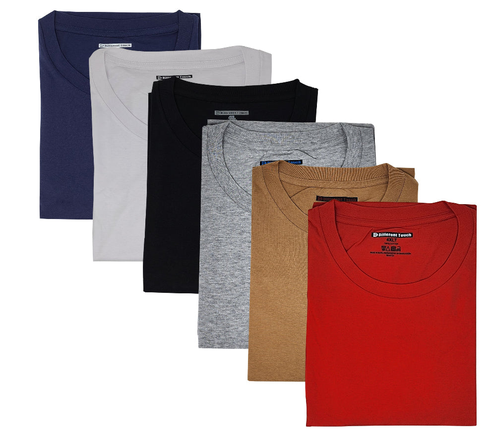Set of six folded Oversize t-shirts in different colors on a white background