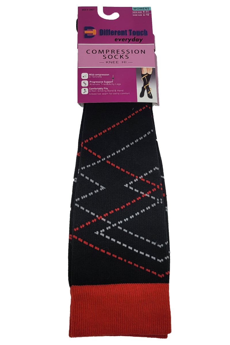 Compression sock with red and white pattern on black background, displayed with packaging.