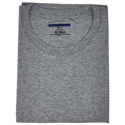 Folded gray Oversize t-shirt with a brand label on a white background