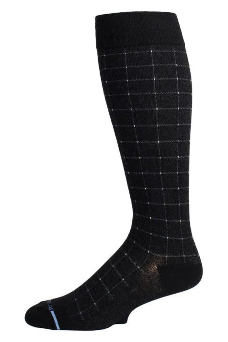 A pair of black Dr. Motion compression knee high socks with a pin dot grid pattern for men.